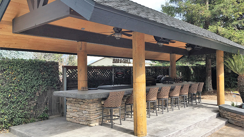 How much value does a covered patio add to your home? Freestanding backyard patio covering entertaining countertop bar space