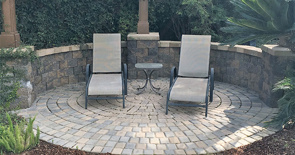 Pavers vs Flagstone vs Concrete - Which is Best - pavers circle seating area