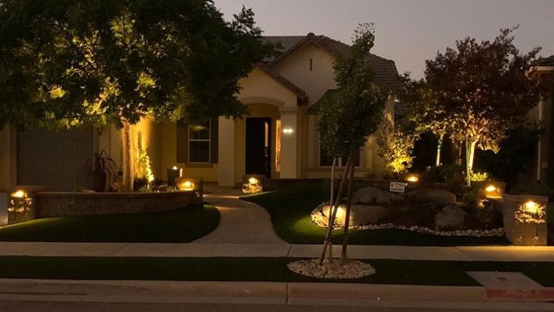Landscape Lighting Trends for 2024 - front yard with accent lights and pathway lighting